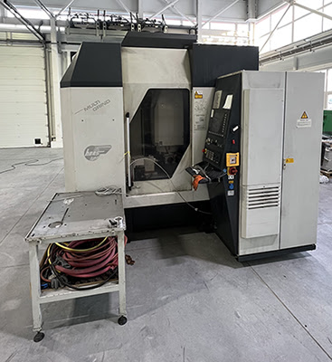 Haas Multigrind HT (2004 | бу) – 5-осевой шлифовальный центр с возможностью фрезерования